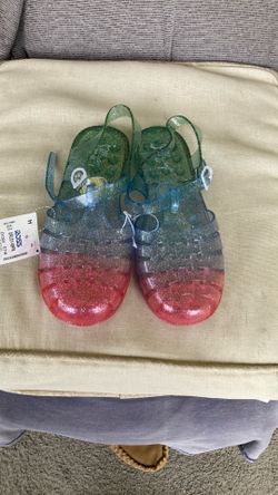 Plastic sandals.  Size. 3.  New