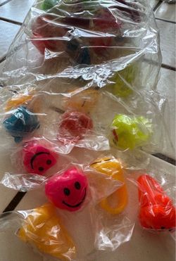 NEW…56 piece light up plastic rings