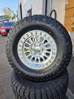 17" KMC w/ 33x12.50R17 RT tires