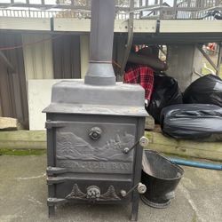 Vintage Glacier Bay Cast-Iron Wood Stove + Metalbestos Insulated Chimney Kit – Ready to Use