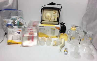 Huge Medela Pump in style breast pump Lot