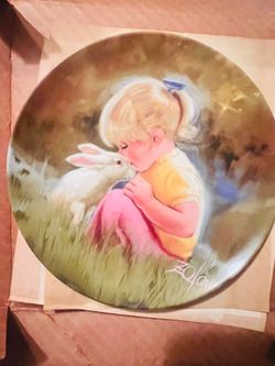 This collector plate, titled "Tender Moment" from the "Children and Pets" series, features artwork by Donald Zolan and was produced by Pemberton & Oak