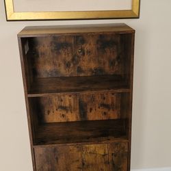 Beautiful industrial mid-century modern three-tier bookshelf.
