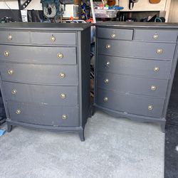 2 large black dressers