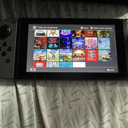 Nintendo Switch with 6 games and 1 extra joycon 