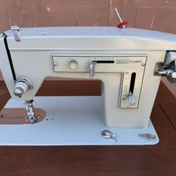 Collectible Vintage Sears Kenmore sewing machine model 5186 w table