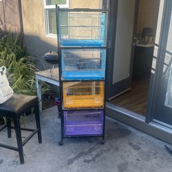 4 Used Bird Cages With Stand On Wheels 