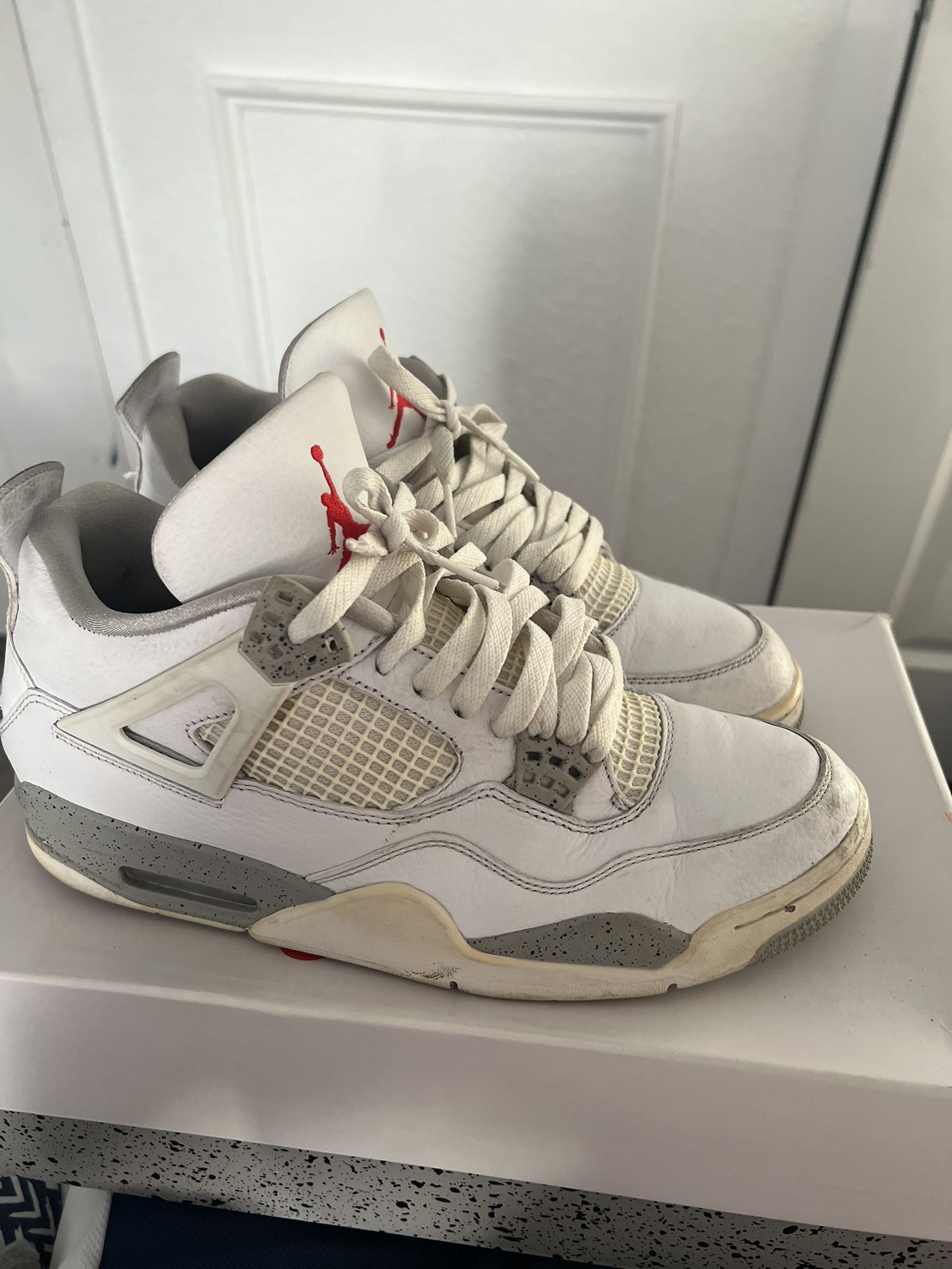 white oreo jordan 4’s