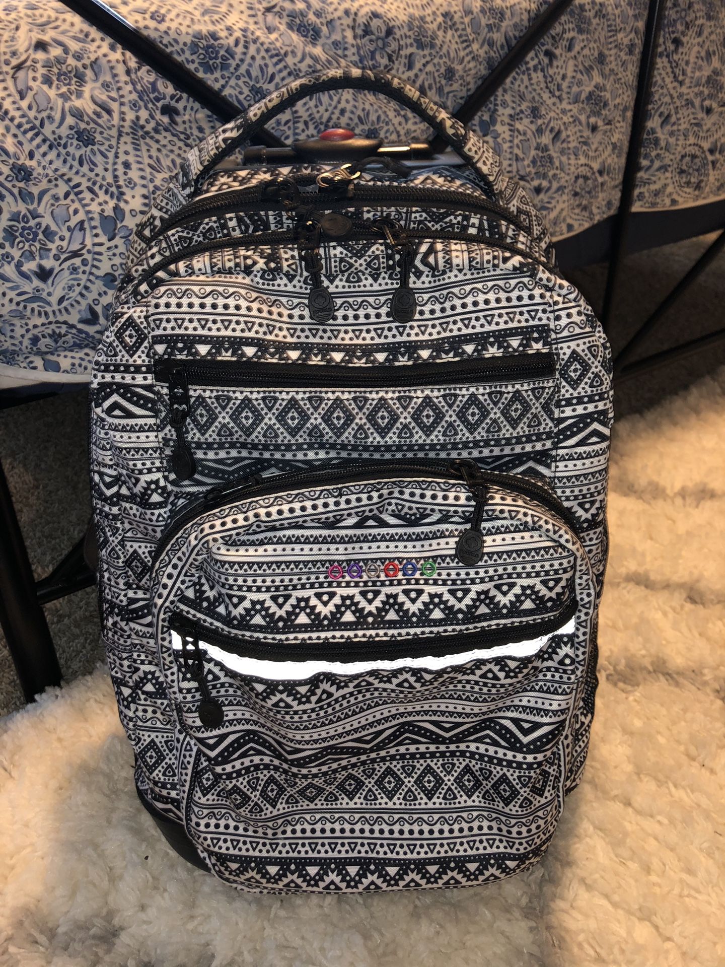 Great Rolling backpack with many pockets and carrying space