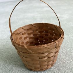 Longaberger Basket With A Handle  7.5” Tall With A Diameter Of 5.5”