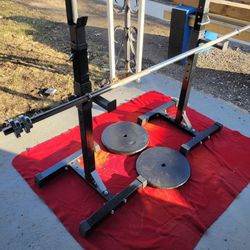  ADJUSTABLE SQUAT RACK 100LBs. 1" HOLE 6'STRAIGHT BAR.  2-50s PLATES 
11525 S HALSTED DUNKIN DONUTS/7111.S WESTERN WALGREENS 
150$   CASH ONLY. AS IS