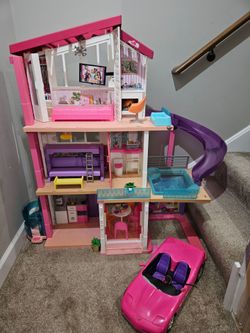 Barbie dream house with pool and elevator..has some cracks see all pictures