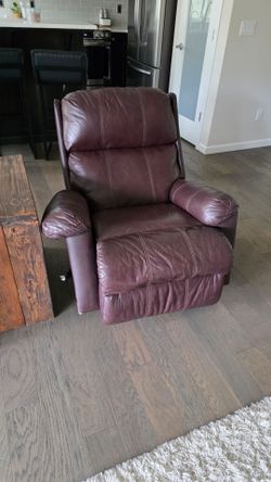 Reclining leather rocker chair brown.