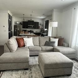 Ashley Gray Sectional  sofa and ottoman for sale