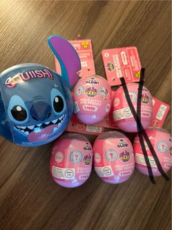 Hello kitty light up clickeez and stitch squishy