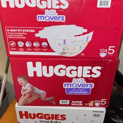 3 Boxes Of Huggies Diapers 