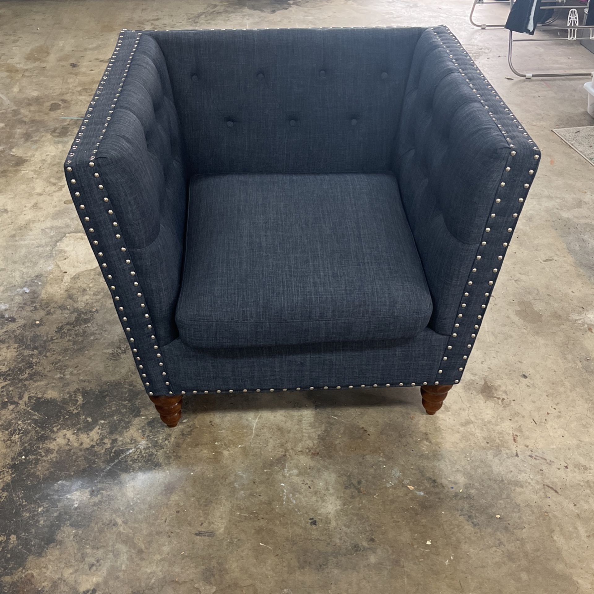 Great Used studded navy Blue Sofa chair