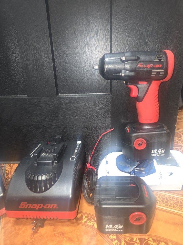 Snapon Impact Torque Wrench With 2 Batteys & Charger All Work Great.