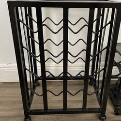 Wine Rack  Holds 16 Bottles 22”H X 15”1/2W X 12”D $15 Firm