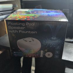 Floating pool speaker with fountain and light show