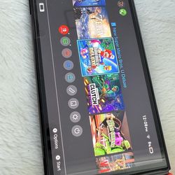 Nintendo Switch with Neon Blue and Neon Red Joy Con