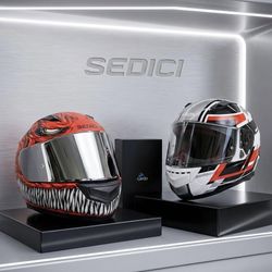 Two Sedici motorcycle helmets in excellent condition with very little use.
