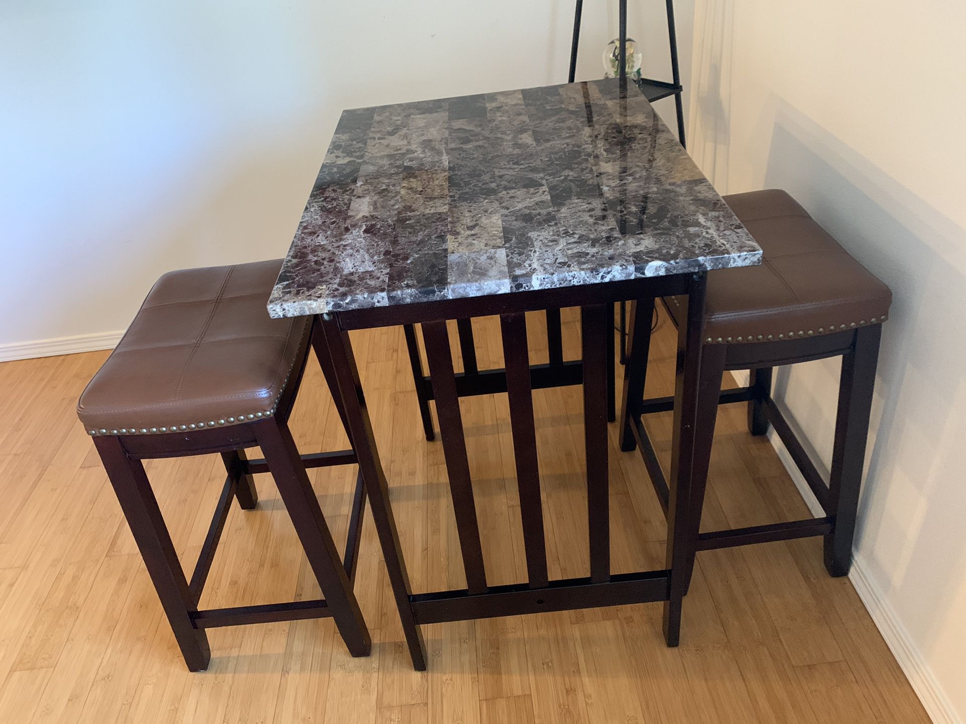 Small high counter table and two stools
