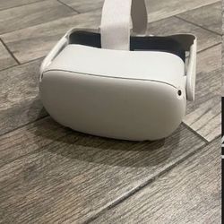 Oculus Headset (used) Comes With Controllers (Bruised A Little) good Condition