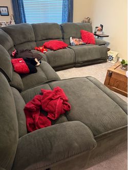 Olive Green Sectional Sofa with Chaise and Electric Recliner. Very comfortable. Not cheap crap.