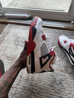 Jordan Retro 4 “Fire Red” Gently Used.