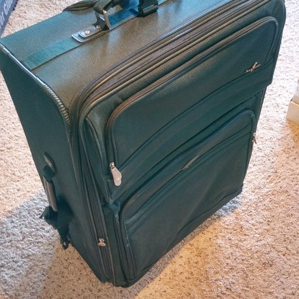Suit Case. On Wheels. 2 Ft X 3 Ft.