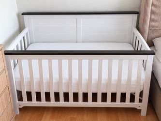 White and Dark Wood Baby Crib