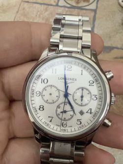 A broken mechanical watch that doesn't keep time. I'll take it away for a look.