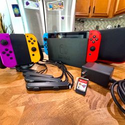 Nintendo Switch V1 Bundle w/ 4 Joy-Cons, Case & Bomberman R 2