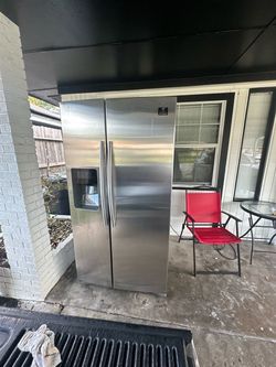 Must go ASAP!! Stainless Steel Side-by-Side Refrigerator with Ice Dispenser