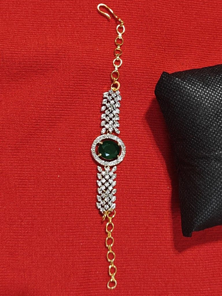 Luxurious Emerald And American Diamonds Bracelet Gold Plated