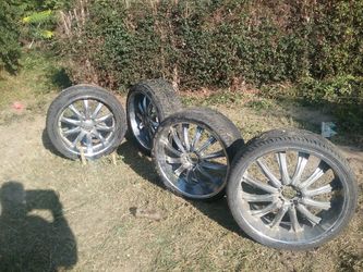 One set rims and tires and two other rims All tires and rims are 22s the set with the caps are 15 by 22 they are for a truck