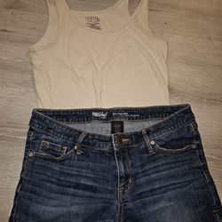 Size 8 Shorts With A Small Creme Colored Top