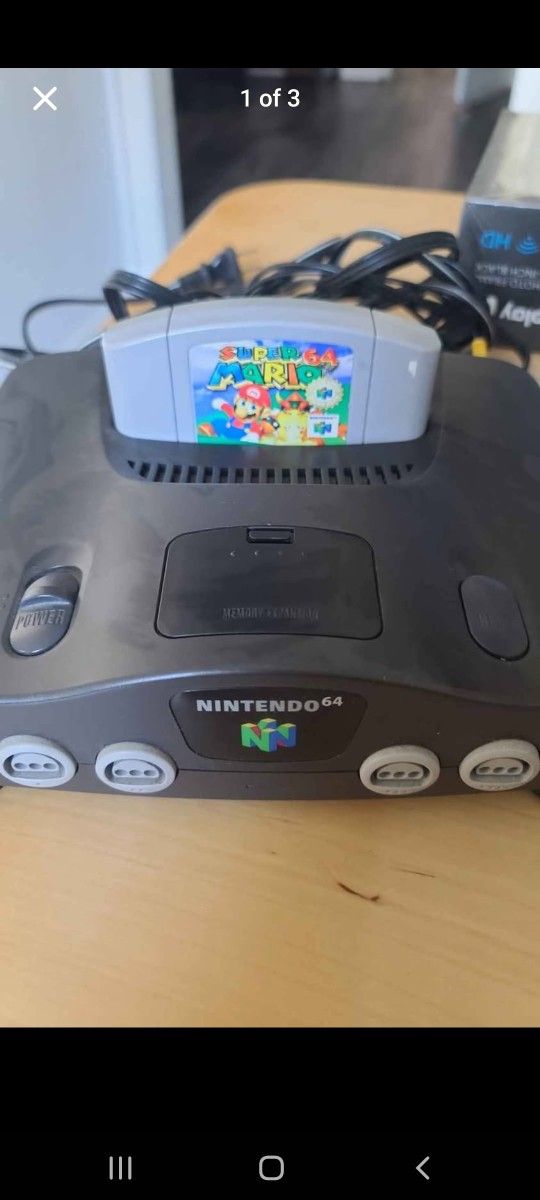 Nintendo 64 System With Expansion Pack 4 Controller And Super Marion 64 Game