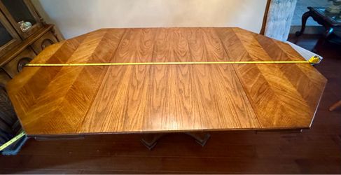 Dining room table, chairs and hutch