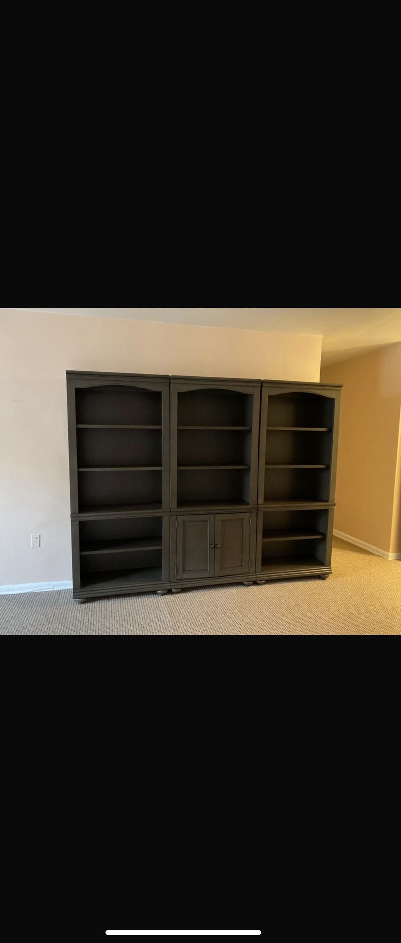 Set of three solid wood vertical bookshelves 