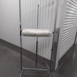 Plastic Garment Bags (as Pictured In Photos ) Have Two Brand New Rolls Of Garment Bags + I Roll Of Plastic (Not Bags)All Three For $95. Rack  Is Sold.