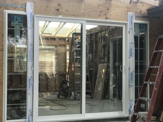 Sliding door with two windows on the side