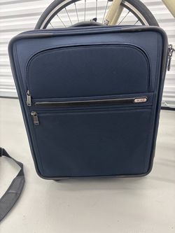Tumi Navy Blue Rolling Carry-On Luggage