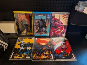 DC comics absolute batman, absolute superman and absolute wonder women