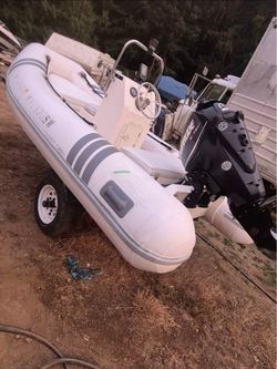 RIB Inflatable Boat with Evinrude E-TEC Outboard Motor