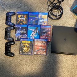 PS4 Slim With Controllers and Games