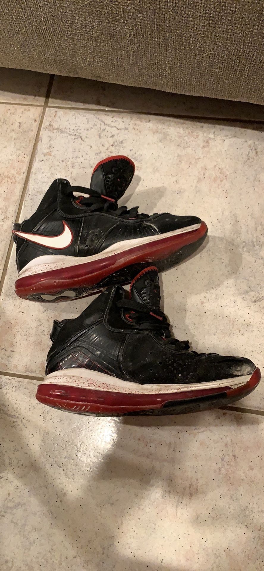 2 pairs Nike lebron James hi top sneakers. Size 6