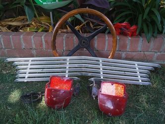 1927 Chevy coupe grill taillights Sold wheel Sorry