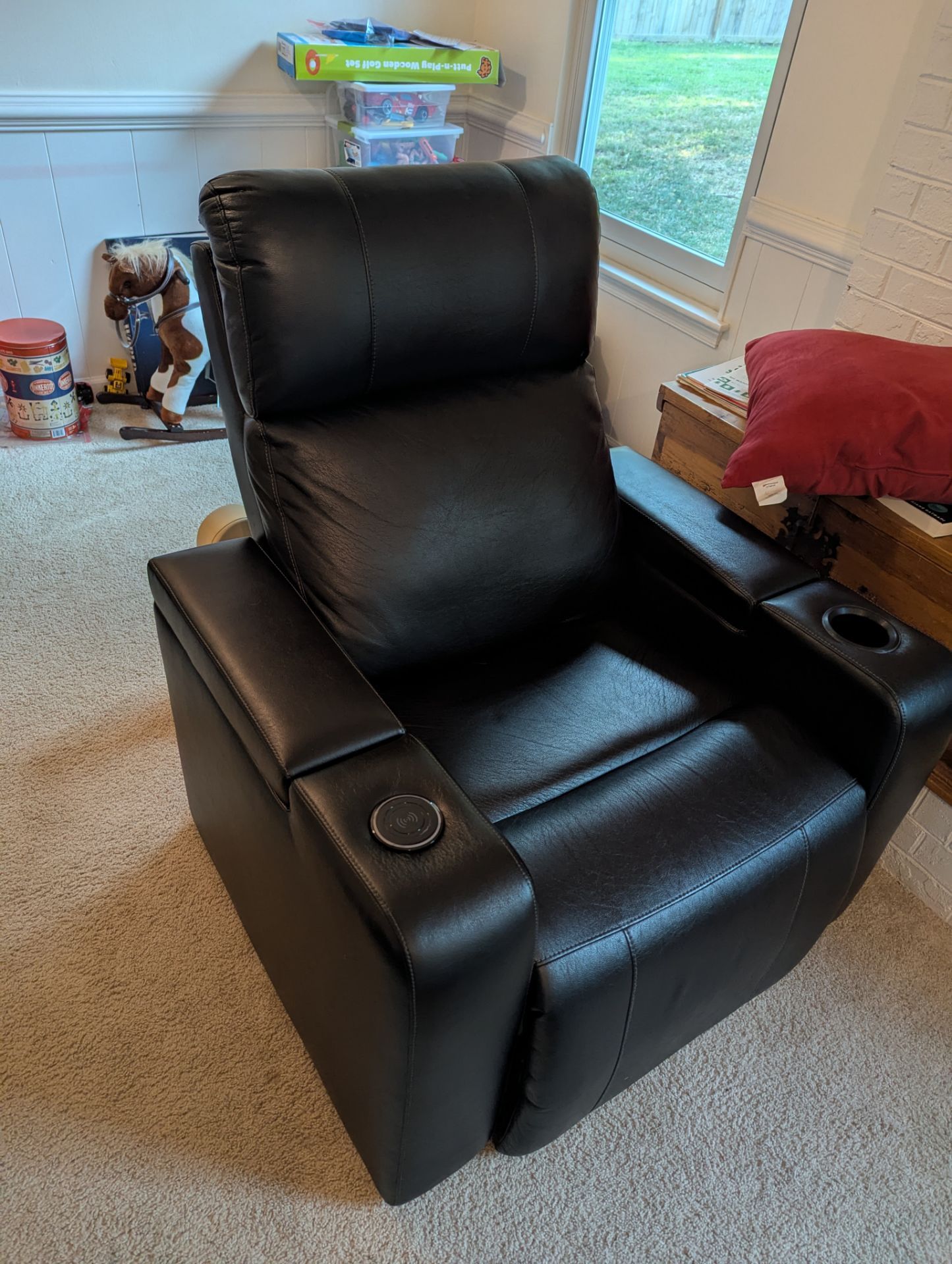 Recliner with wireless charger.